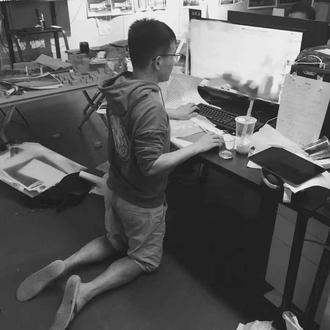 Kyle at a workbench in a workshop