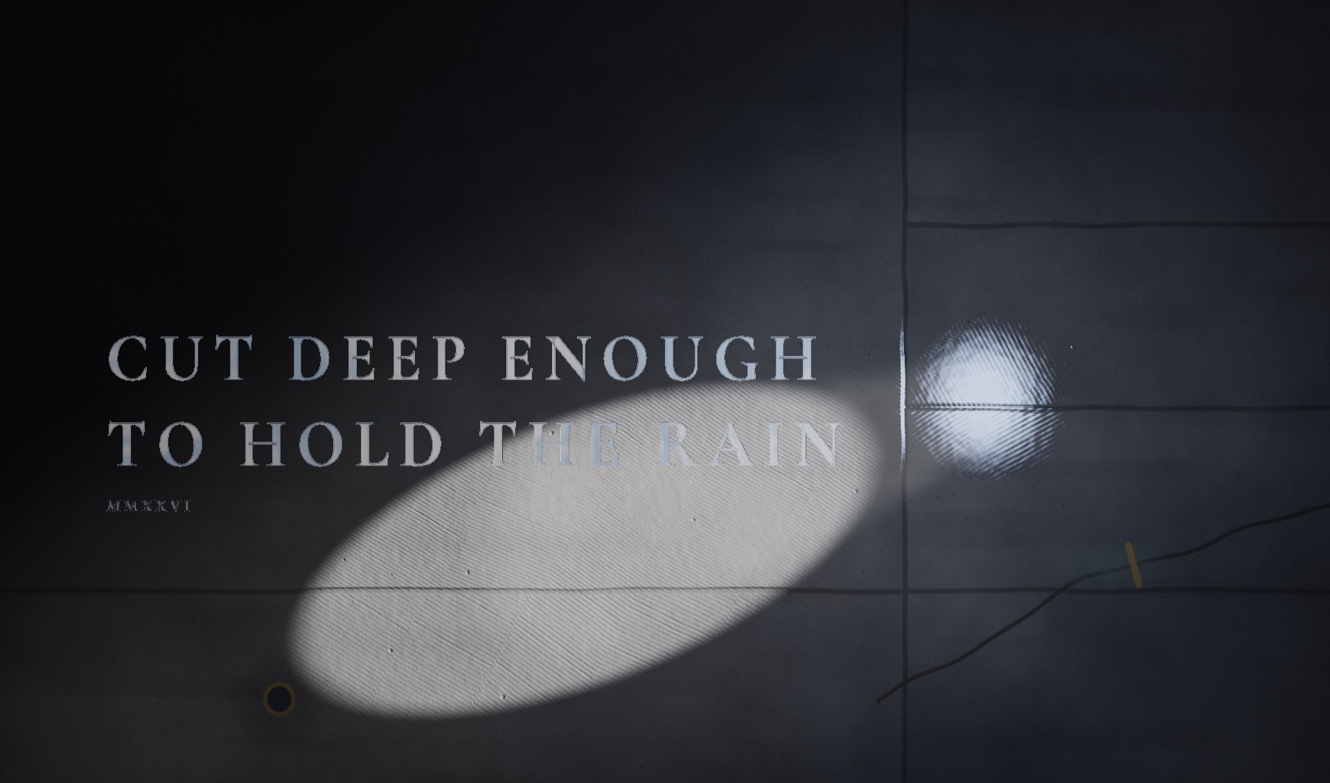 A dark stone floor seen from above, the words CUT DEEP ENOUGH TO HOLD THE RAIN cut into it, an ellipse of light falling across them